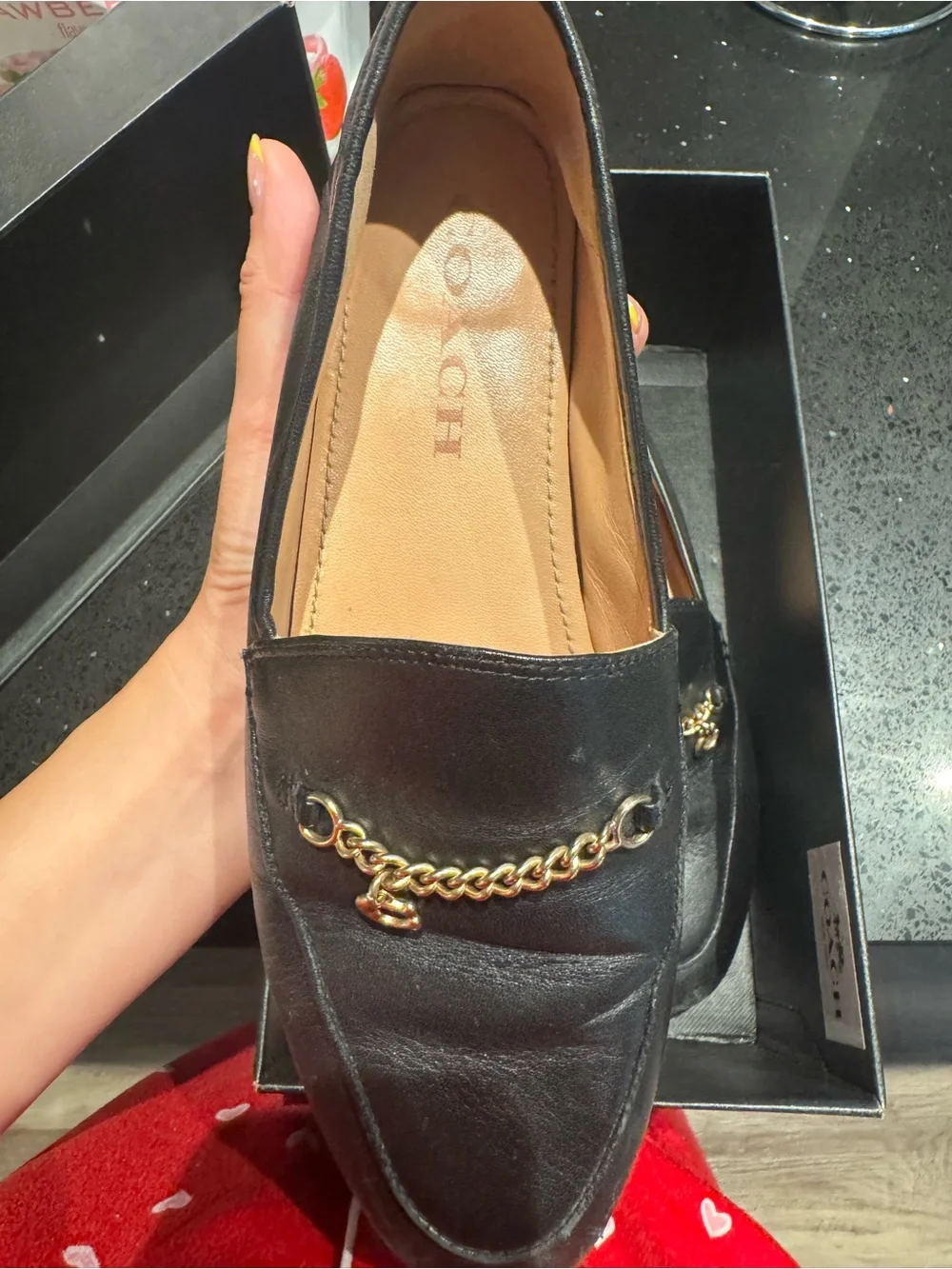 Coach Black Leather Loafers with Gold Chain Accent